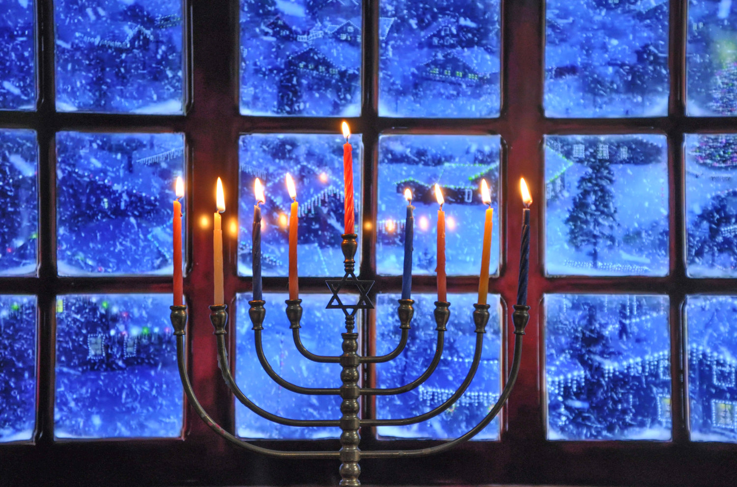 My Gramma's brass menorah is real, but I faked the festive background on my TV.